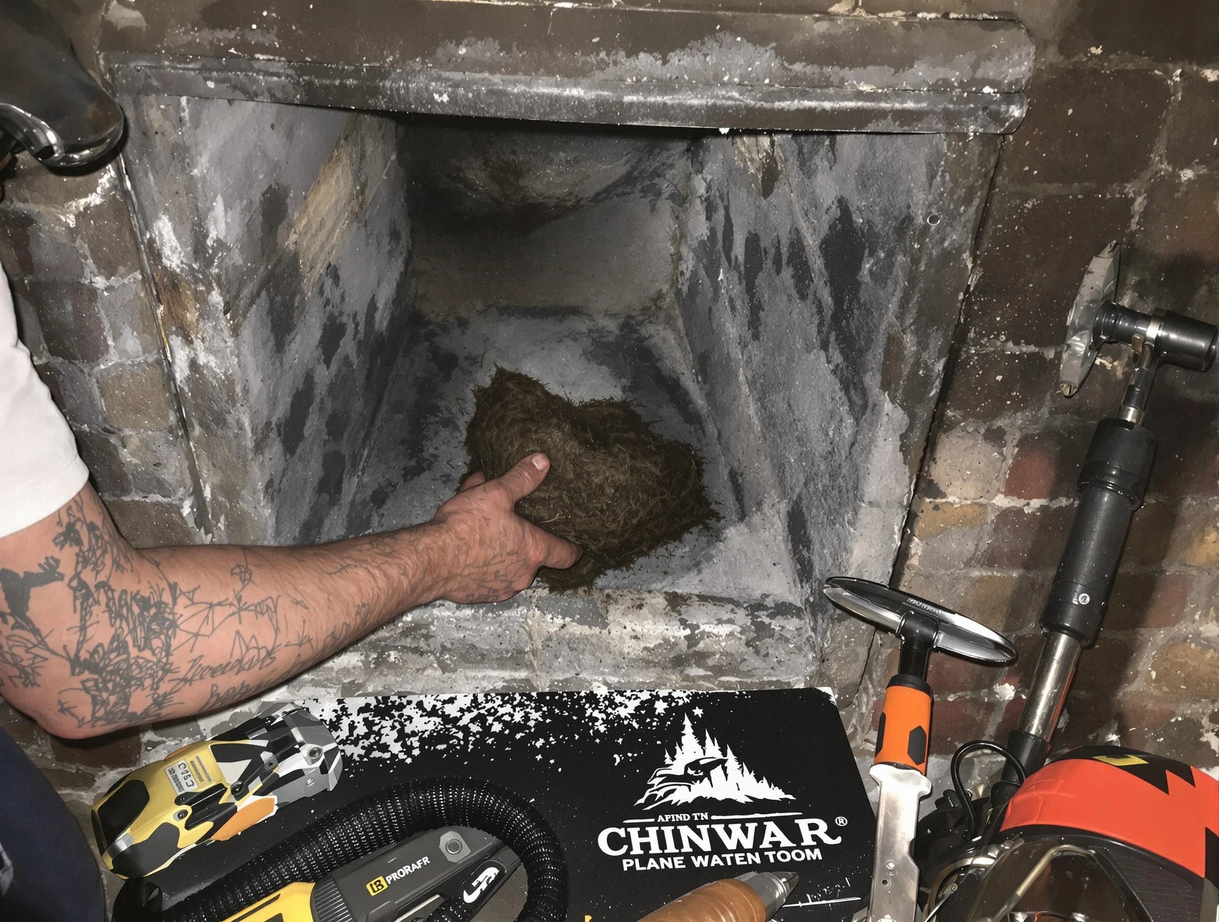 South Plainfield Chimney Sweep safely removing debris and screening chimney in South Plainfield, NJ